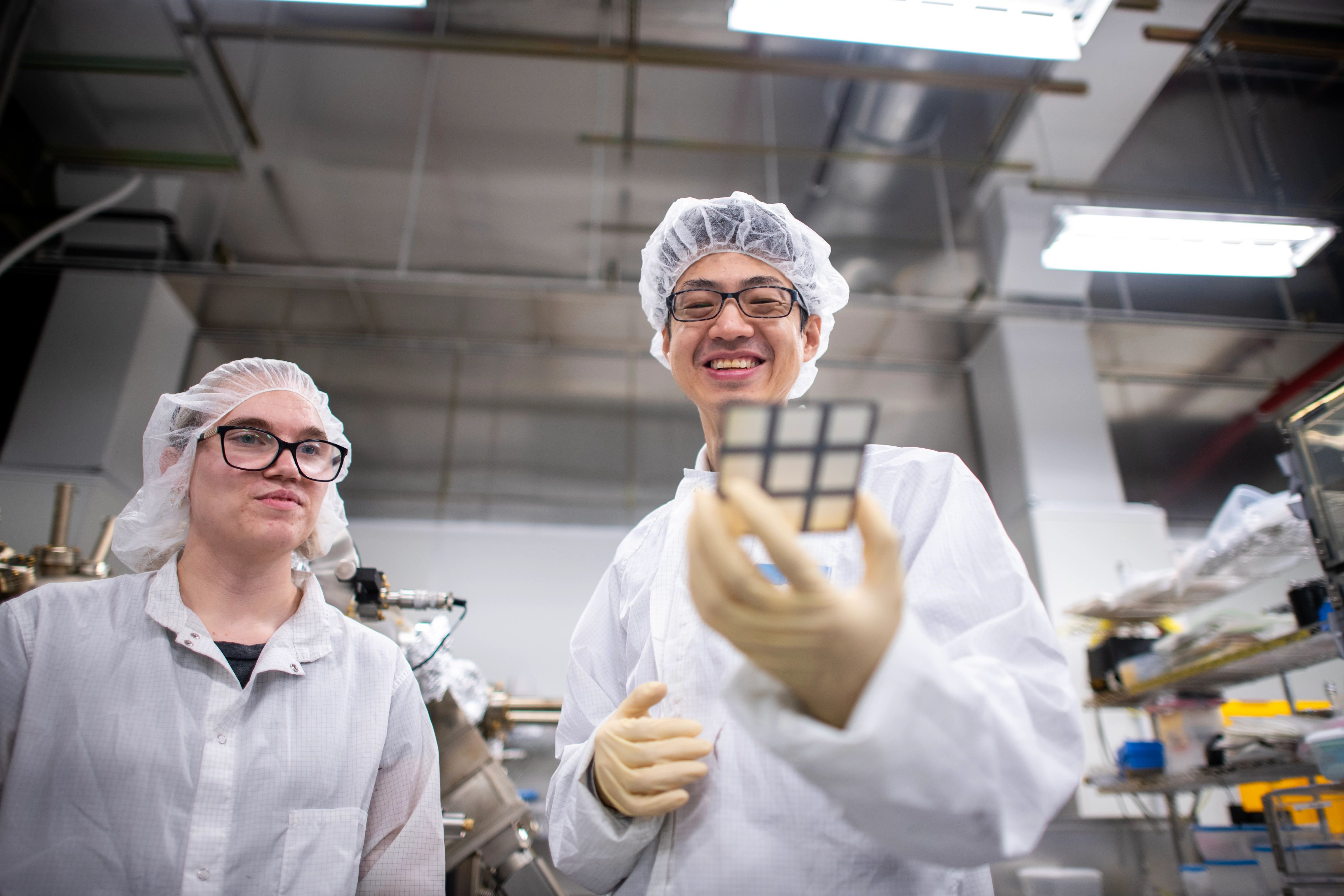 Two students study semiconductors in a lab at Arizona State University
