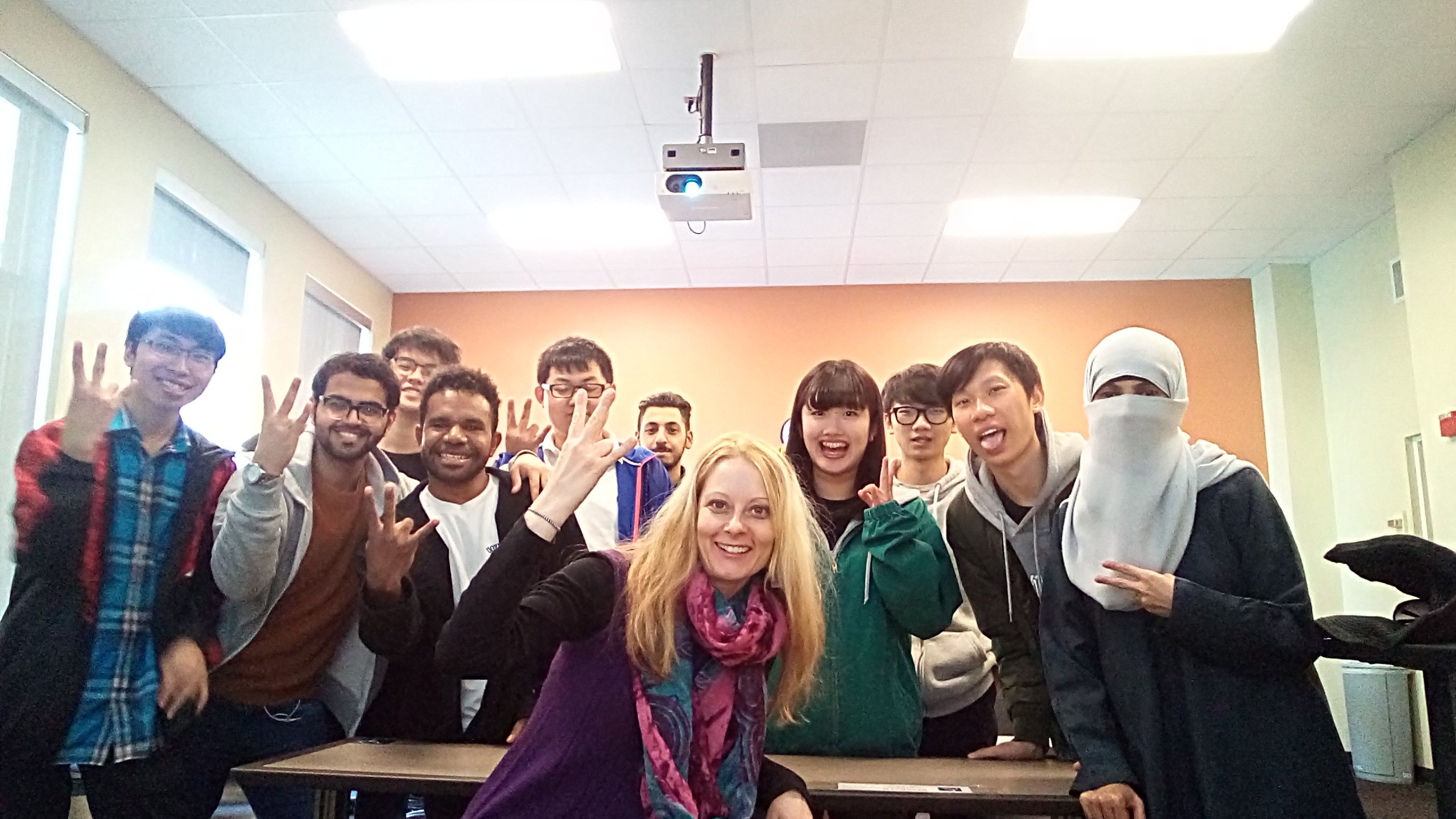 Students pose for a group photo with the Global Launch Educator.