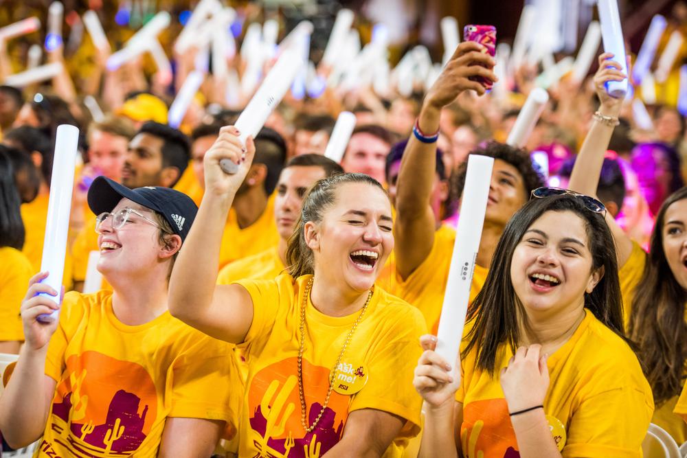 Freshman having fun at an ASU pep rally, showing their school pride. 