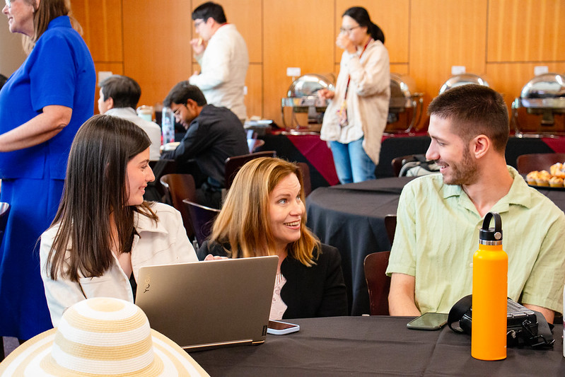 ASU Cintana Alliance participants networking and discussing presentation topics on innovation and sustainability.