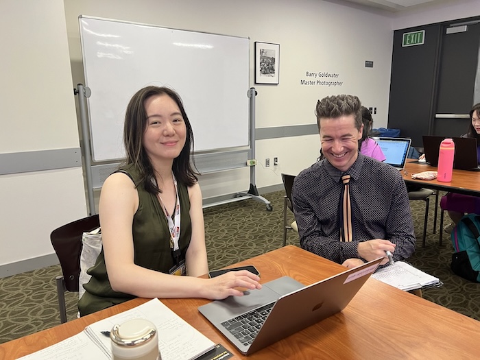 Shangyu Sheng at laptop with Vincent Lauter. Photo by Peifen Chen.