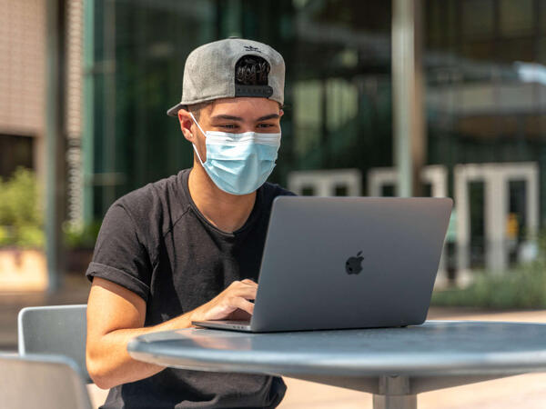 ASU Student using laptop