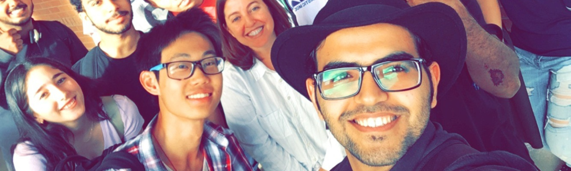 Mohammed poses for a group selfie with classmates.