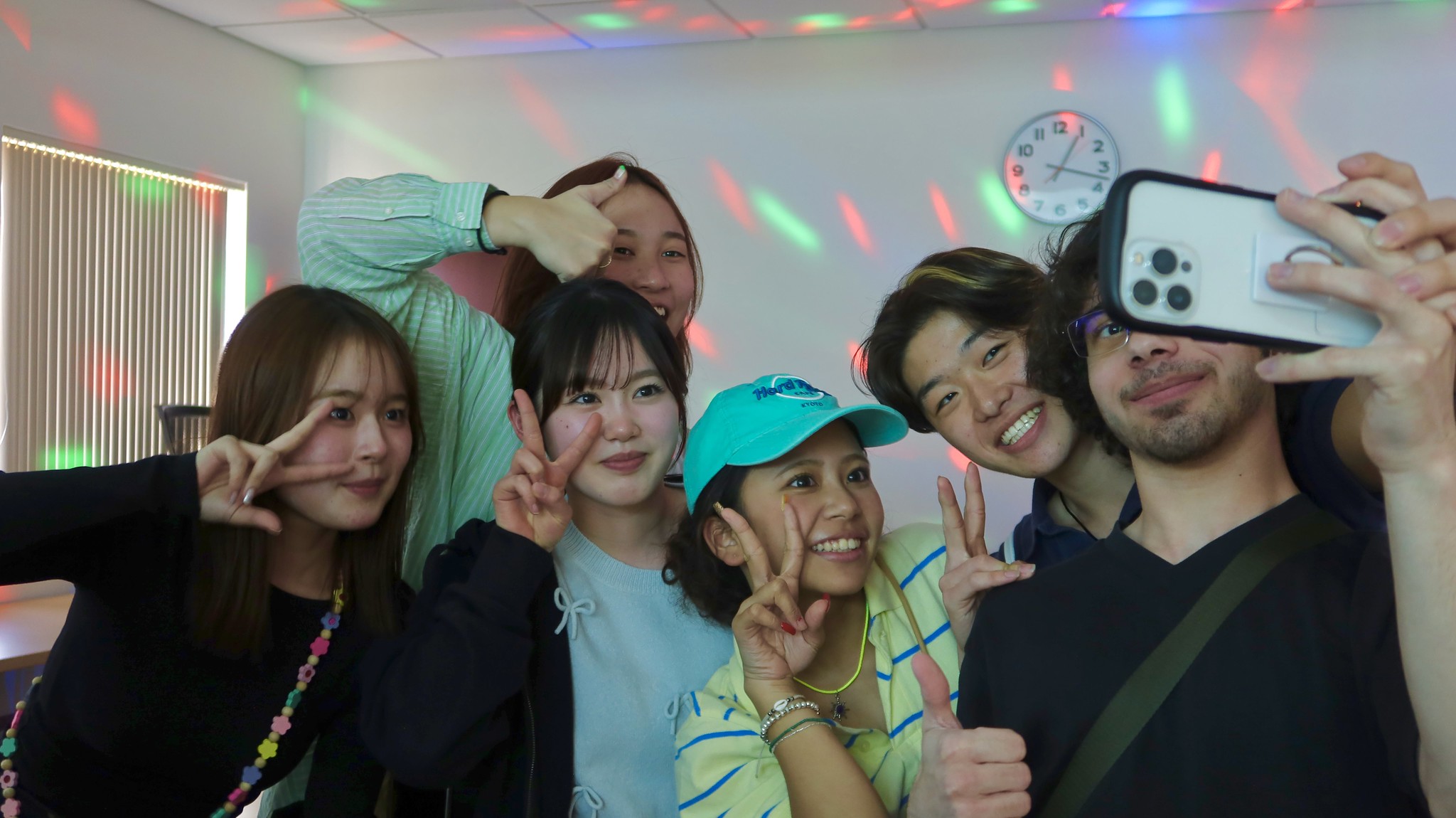 Several ASU Global Launch students take a selfie during karaoke at Global Hangout.